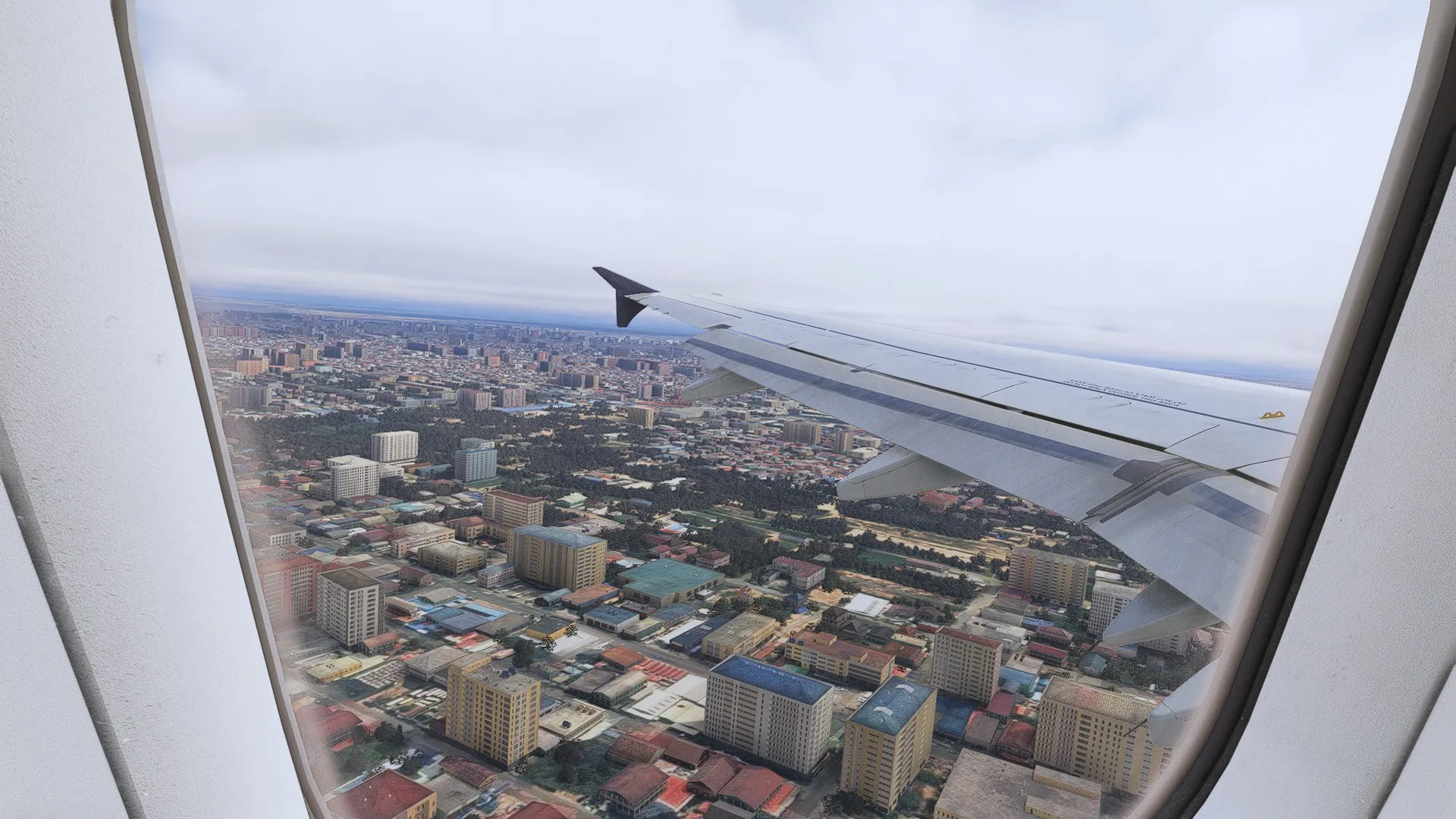 Air Combs wing view on approach to Phnom Penh