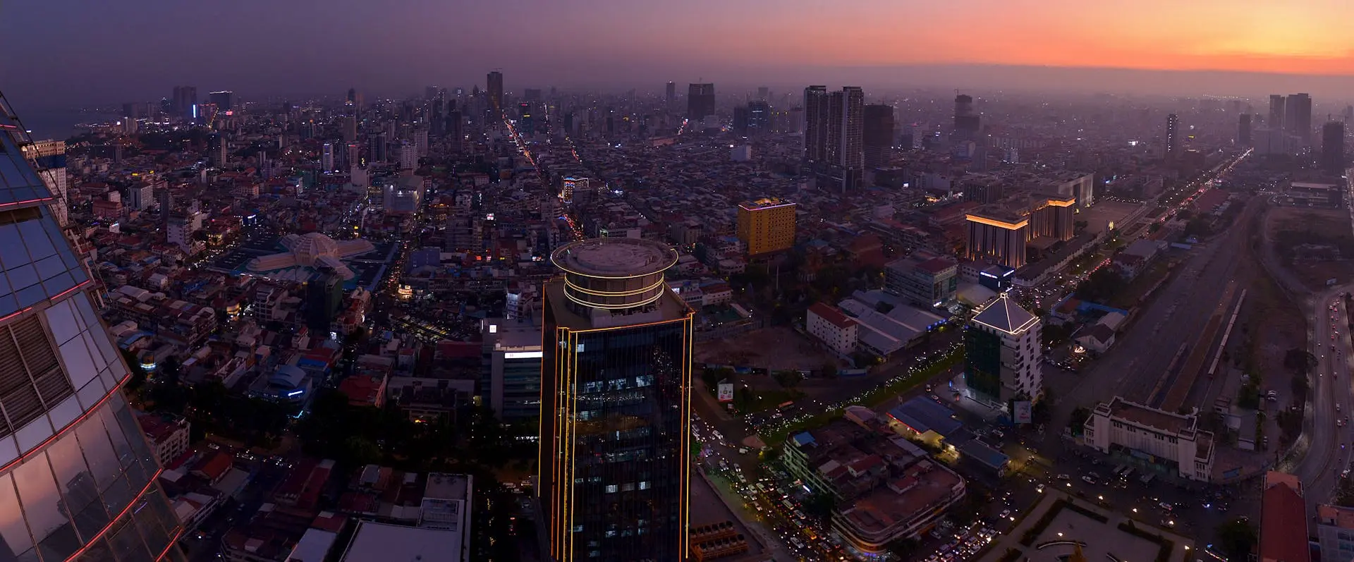 Night view over Phnom Penh city buildings